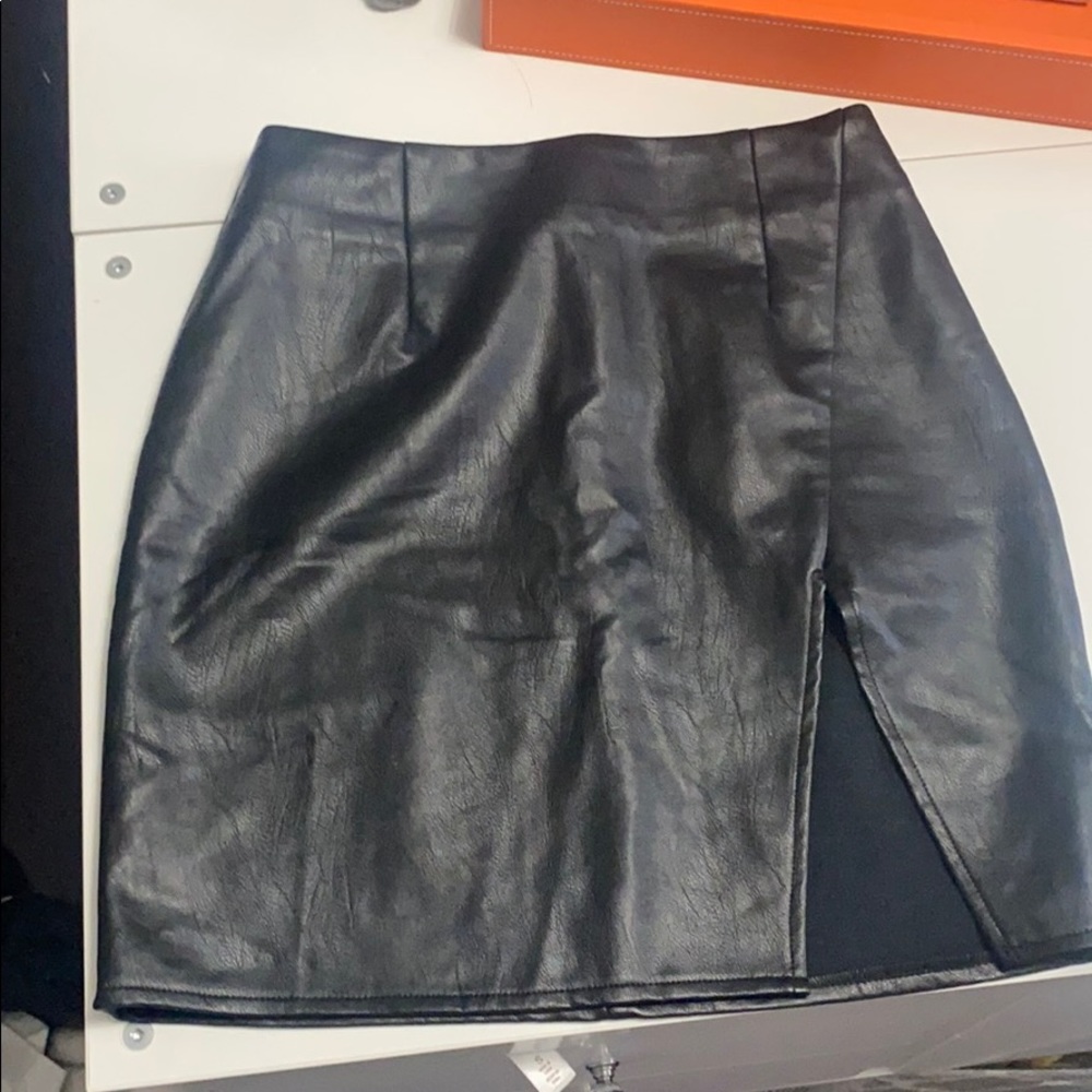 Black faux leather mini skirt